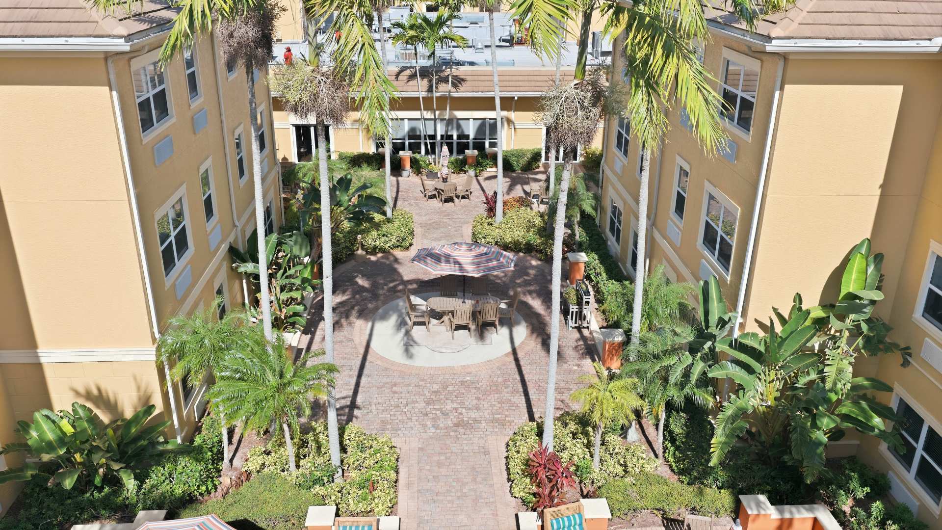 exterior garden area with gazebo seating and fountain